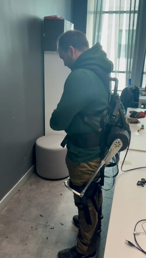 A real V-UP engineering prototype worn during an indoor movement test